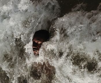 Man surfing in sea