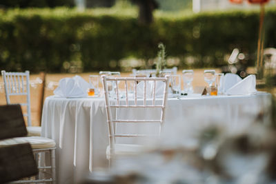 Wedding decoration table in brown and white with glass