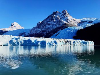 Scenic view of frozen lake against sky