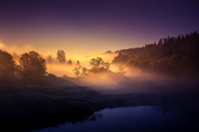 A beautiful river morning with mist and sun light. springtime scenery of river banks in europe. 