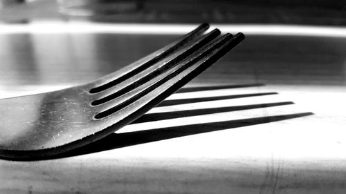 Close-up of piano on table