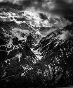 Aerial view of dramatic landscape against sky