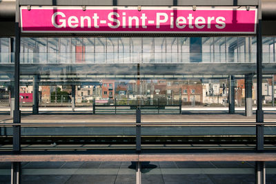 Text on railroad station platform