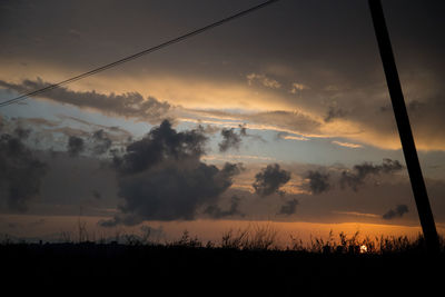 Scenic view of dramatic sky during sunset