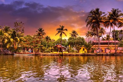 View of swimming pool at sunset