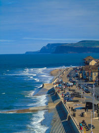 High angle view of sea against blue sky