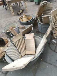 High angle view of chairs and table in basket