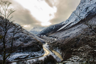 Scenic view of snowcapped mountains against sky