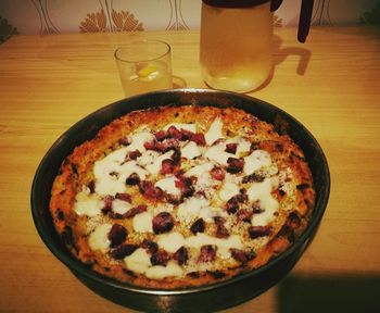 Close-up of pizza served on table