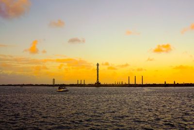 Scenic view of sea at sunset