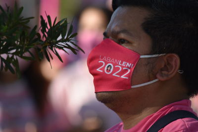 Close-up of man wearing mask