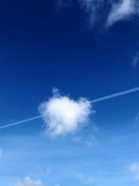 Low angle view of vapor trail in sky