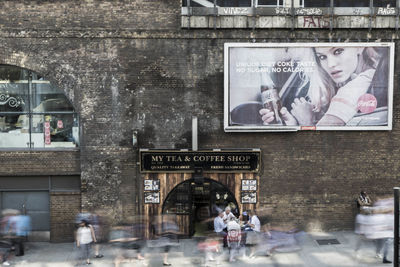 Group of people in front of building