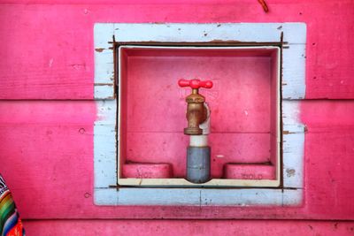 Water tap in a wall