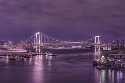 Circular highway leading to the rainbow bridge in odaiba bay of tokyo.