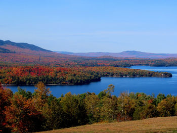 Scenic view of lake against sky during autumn