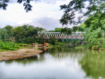 Bridge over river against sky