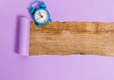 Close-up of clock on wall