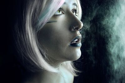 Side view of a young woman