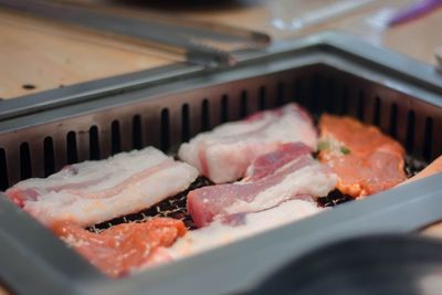 High angle view of meat in cooking pan