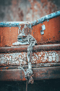 Close-up of rope tied on metal