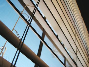 Low angle view of window against clear sky