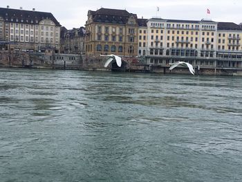 View of bridge over river in city