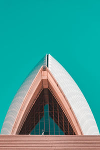 Low angle view of building against blue sky