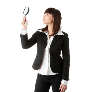 Young woman wearing mask against white background