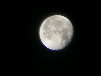 Close-up of moon against clear sky at night