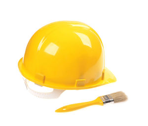 Close-up of yellow hat against white background