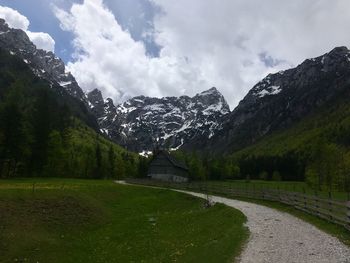 Scenic view of snowcapped mountains against sky