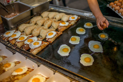 Close-up of man preparing food