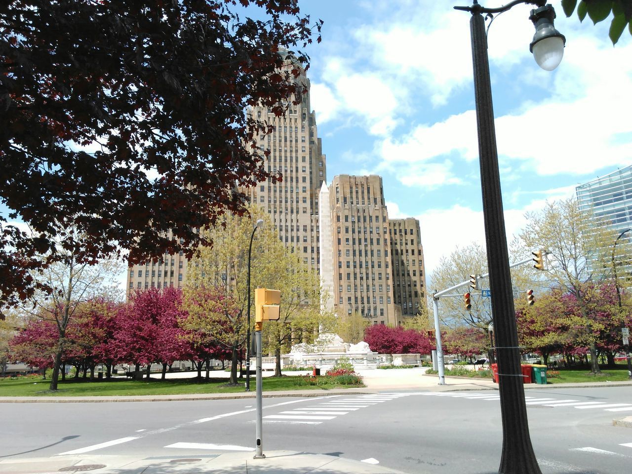 VIEW OF CITY STREET AGAINST SKY