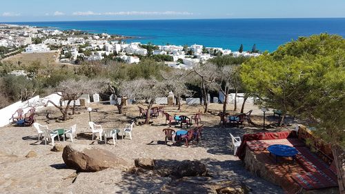 High angle view of people at beach against sky