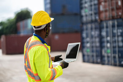 Man working on mobile phone