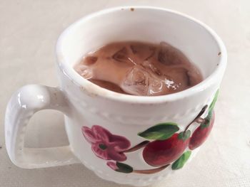 Close-up of coffee cup on table