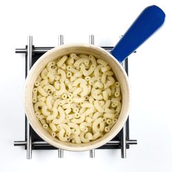 High angle view of pasta in plate against white background