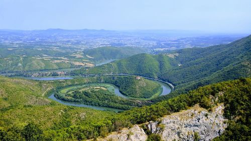 High angle view of winding road against sky