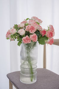 Close-up of flower vase on table