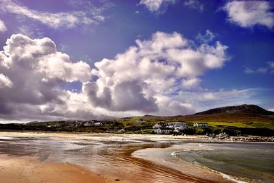 Scenic view of beach against sky