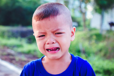 Portrait of boy crying