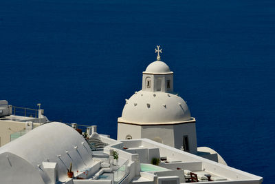 Low angle view of church against clear blue sky