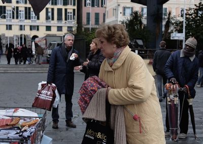 Woman standing in city