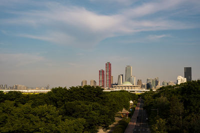 Buildings in city seoul against sky