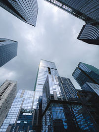Low angle view of modern buildings against sky
