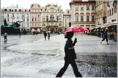 People walking on city street