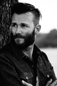 Close-up portrait of mid adult man