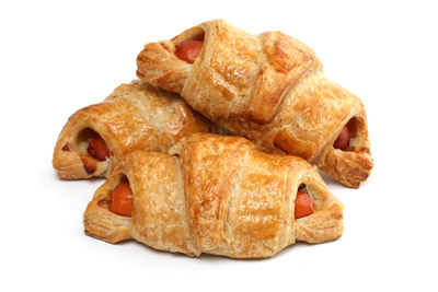 Close-up of burger against white background