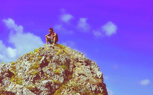 Low angle view of statue against blue sky